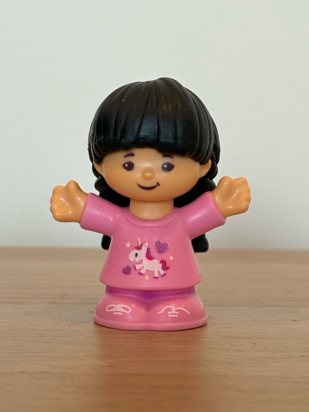 Fisher-Price Little People Girl Figure with Unicorn Shirt and Pigtail Braids
